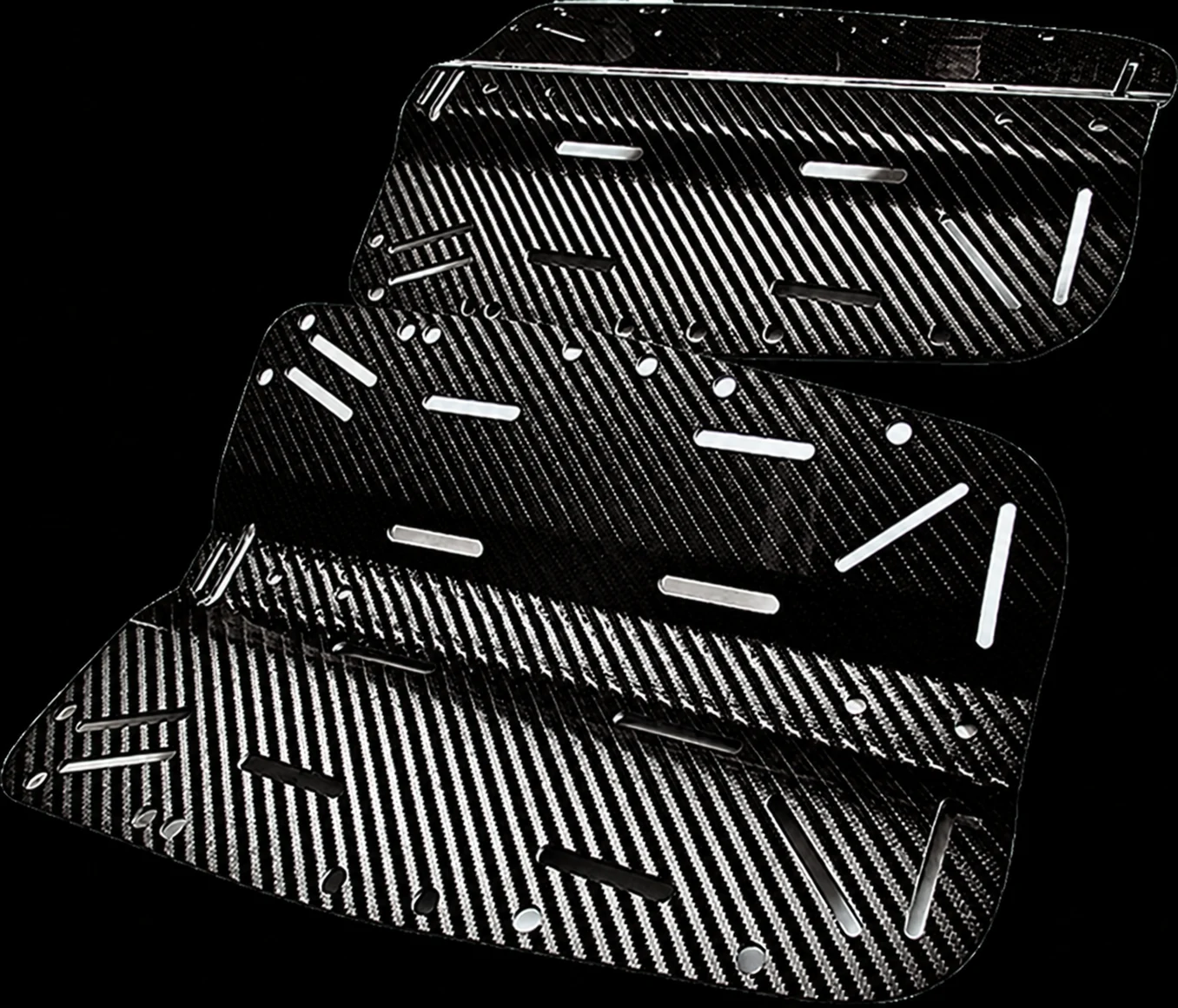 Carbon fiber automotive foot tray set prepared for repeat production