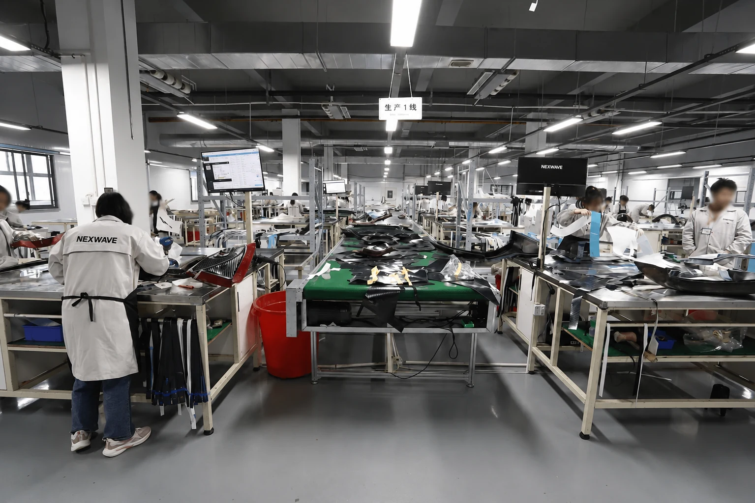 Carbon fiber components moving through an in-house production workshop