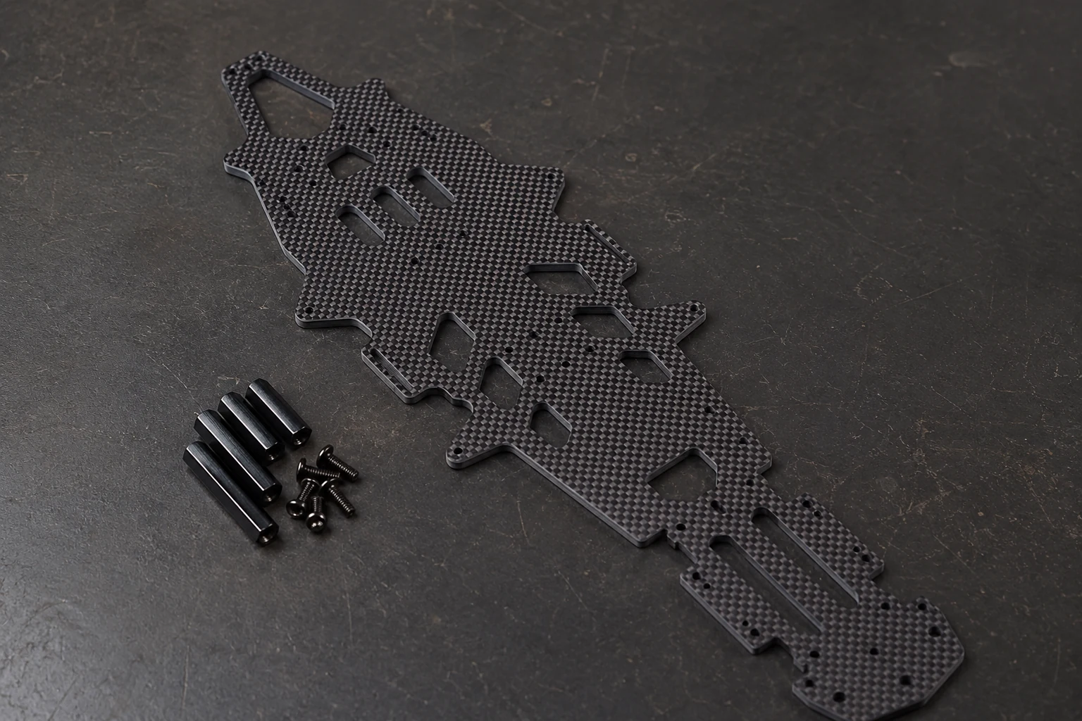 Machined carbon fiber UAV frame plate with mounting hardware