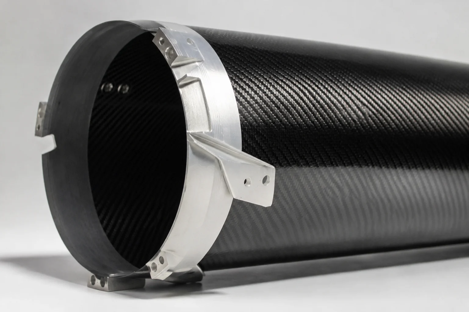Finished carbon fiber tube with machined interface hardware