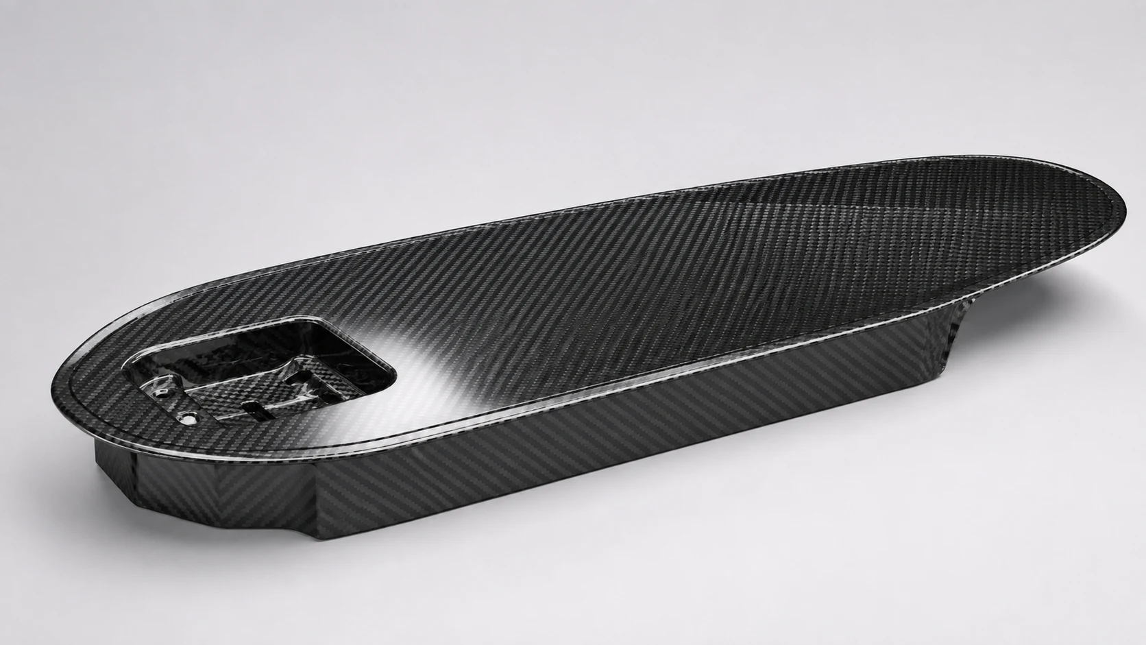 Finished carbon fiber component used to review geometry and manufacturing-route constraints