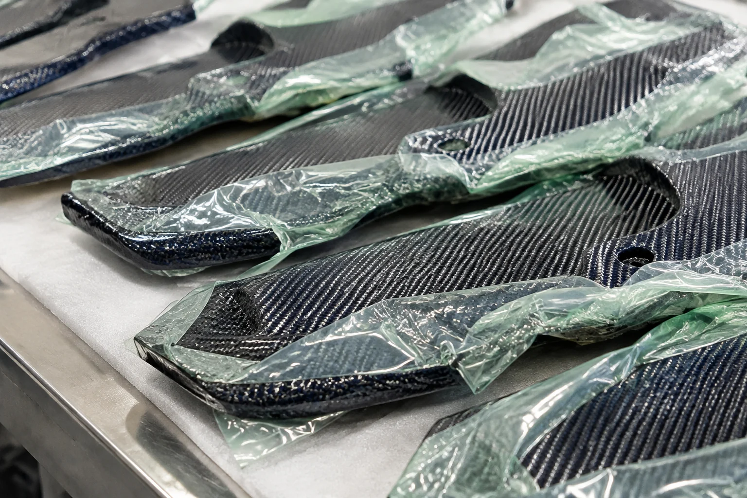 Directional carbon fiber layup showing reinforcement orientation
