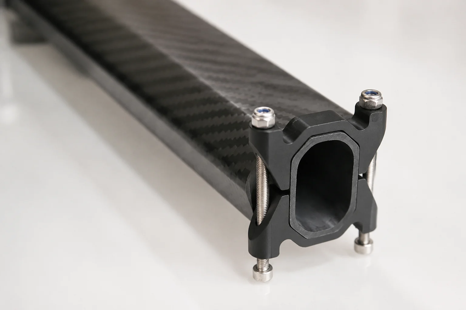 Carbon fiber component interface with mounting points and machined fit features