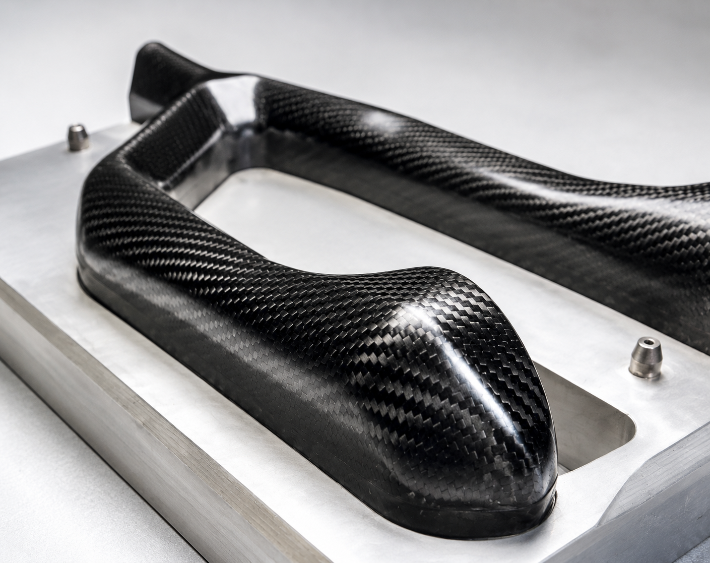 Machined carbon fiber features prepared for assembly fit