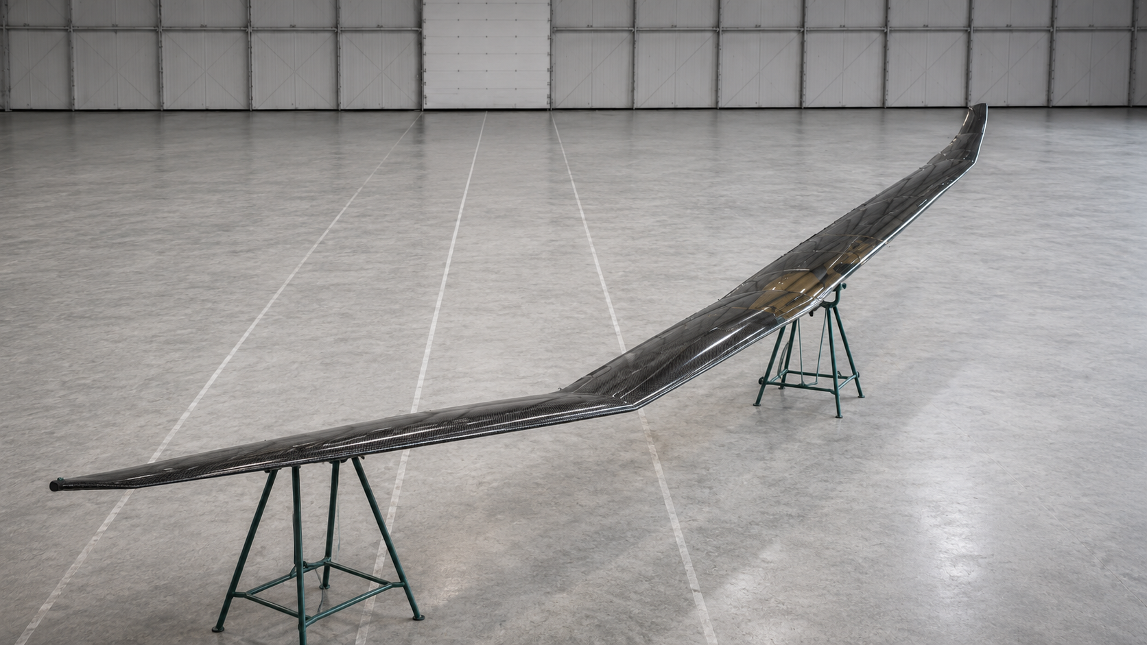 Complex finished carbon fiber component in a manufacturing environment