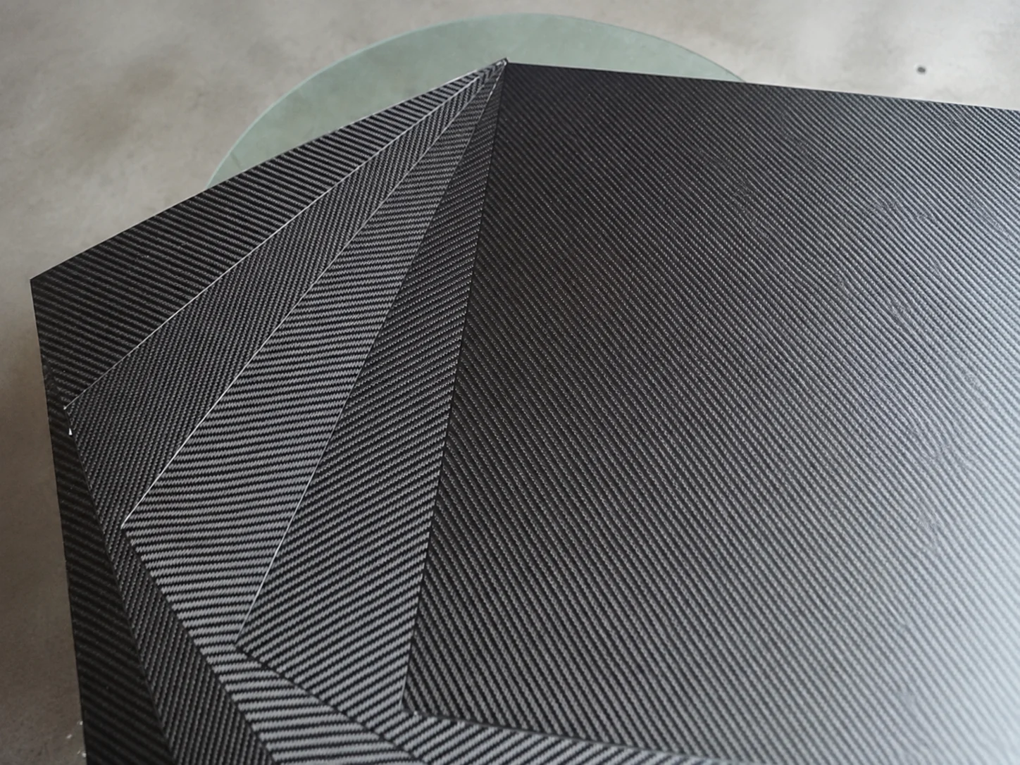 Finished carbon fiber panels joined into a three-dimensional corner component