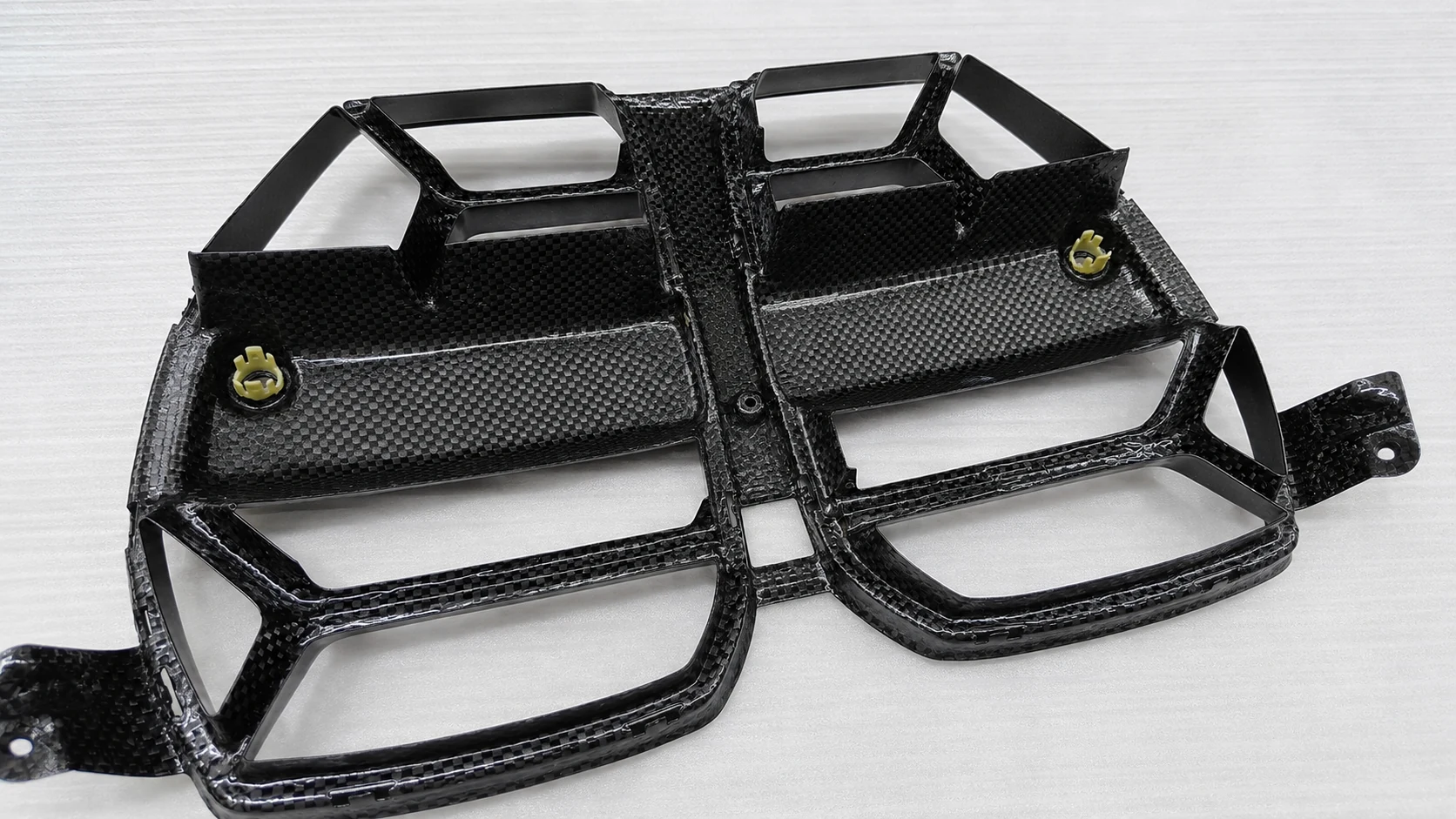 Repeated carbon fiber frame components arranged for an OEM production program