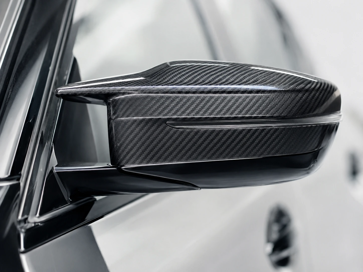 Carbon fiber component fitted against actual vehicle mounting interfaces