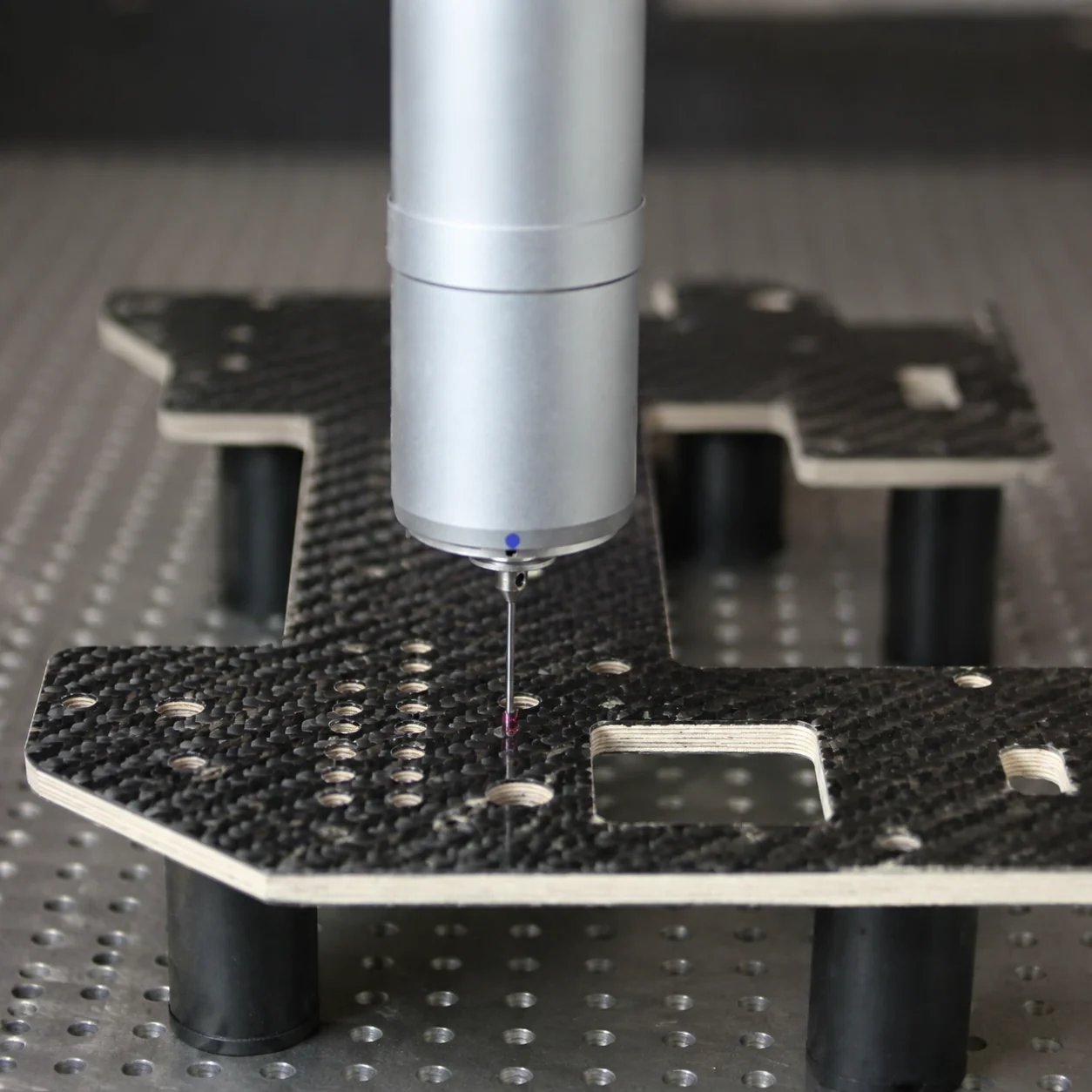 Carbon fiber specimen and measurement equipment in a property test setup