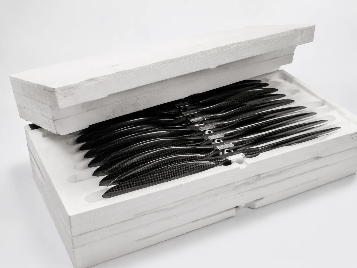 Matching carbon fiber parts separated and protected for repeat-order packing