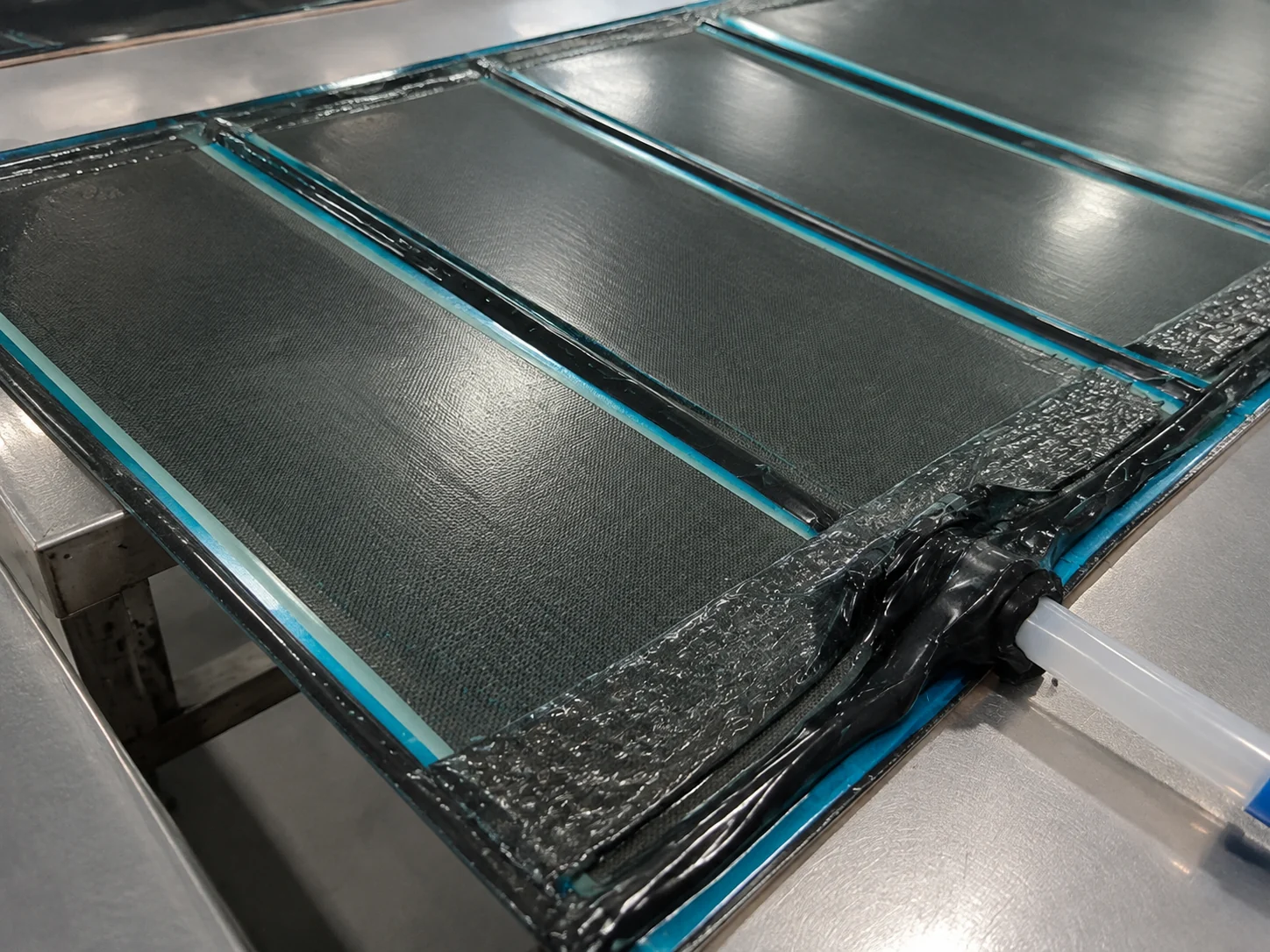 Resin infusion setup over carbon fiber reinforcement panels