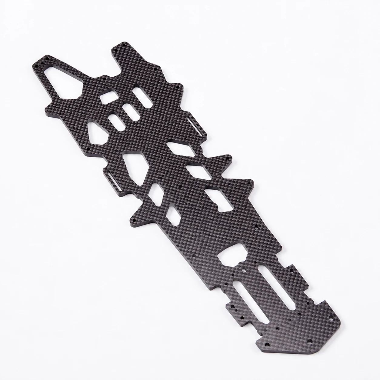 Carbon fiber UAV frame plate variants with controlled cutouts and hole patterns
