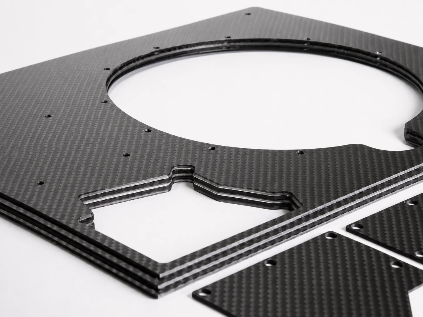 CNC-cut carbon fiber flat components with holes and finished contours
