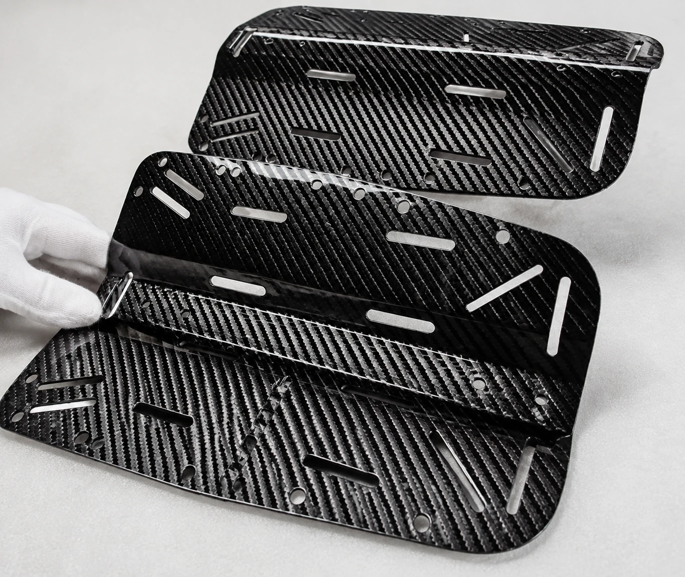 Finished custom carbon fiber component ready for engineering review