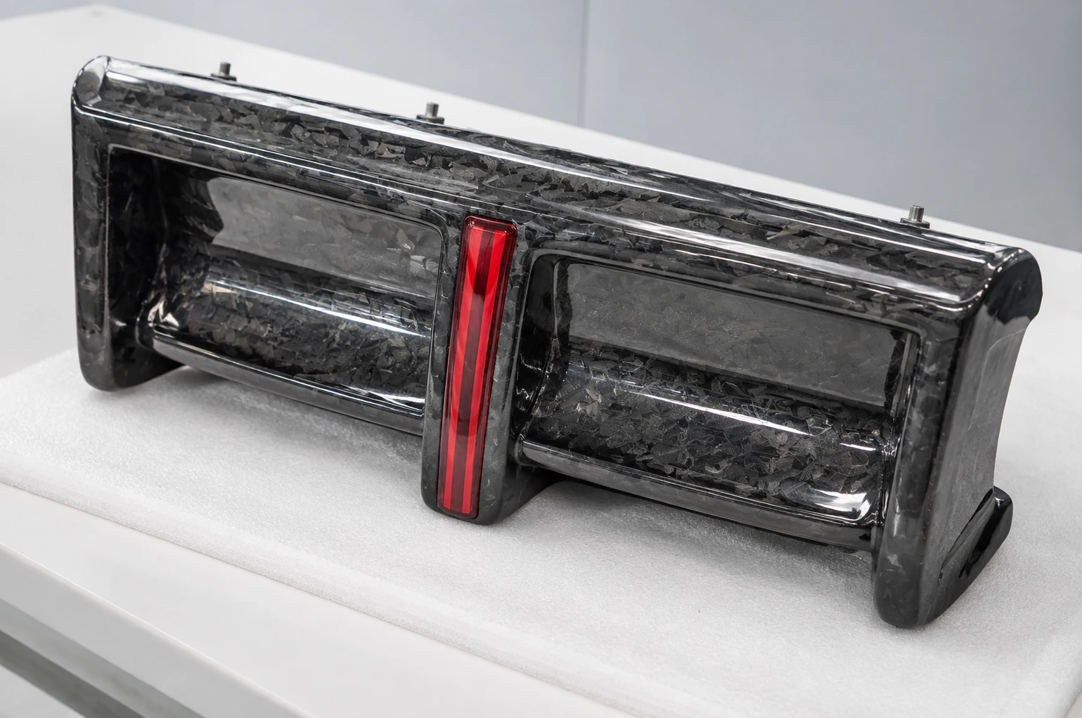 Finished carbon fiber shell surface and edge detail